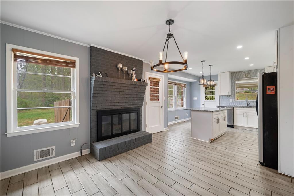 4329 Cedar Valley Lane Conley, GA 30288 - Photo 3 of 25 a view of a kitchen and dining room
