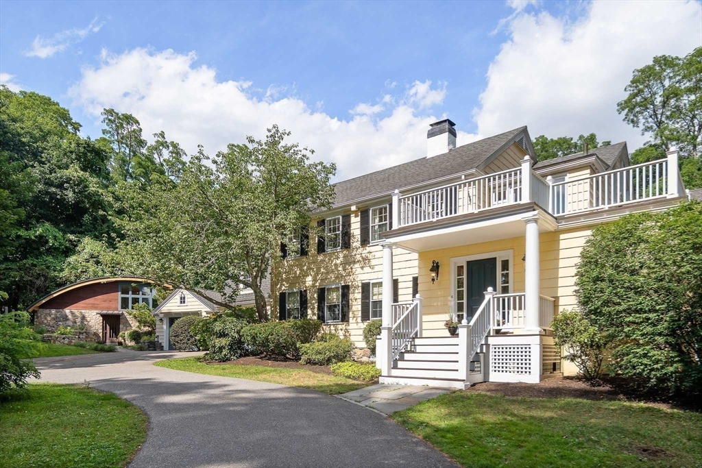 44 Ripley Hill Road Concord, MA 01742 - Photo 2 of 40 a front view of a house with a garden