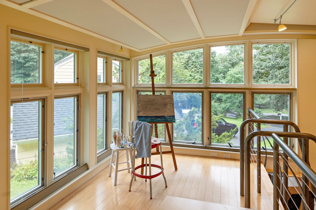 44 Ripley Hill Road Concord, MA 01742 - Photo 27 of 40 a view of a room with furniture wooden floor and windows