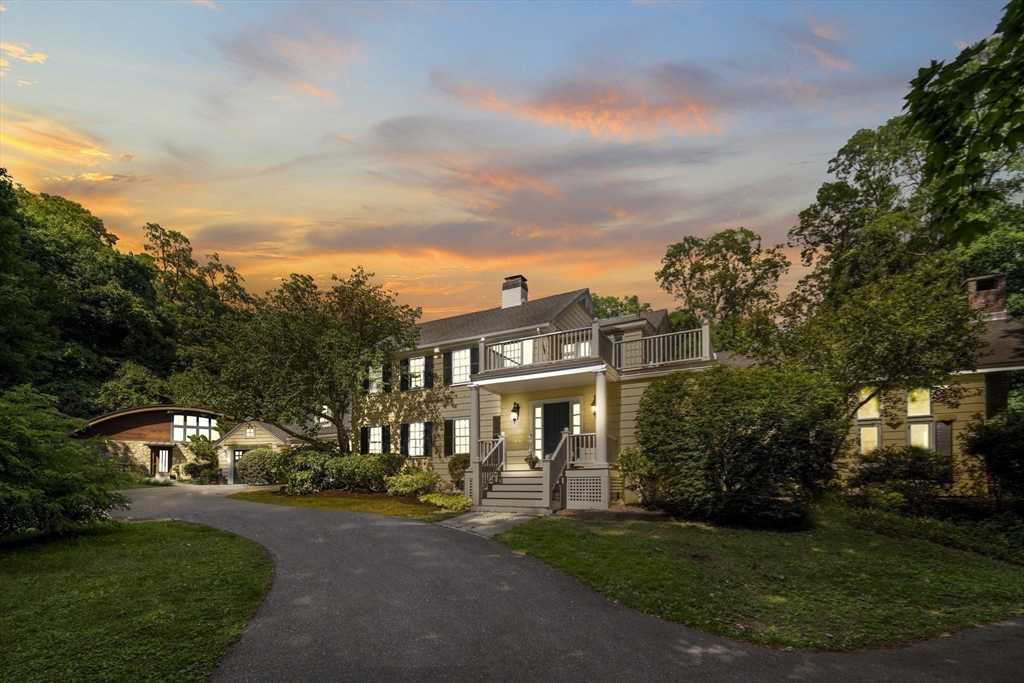 44 Ripley Hill Road Concord, MA 01742 - Photo 34 of 40 a front view of a house with a yard and green space