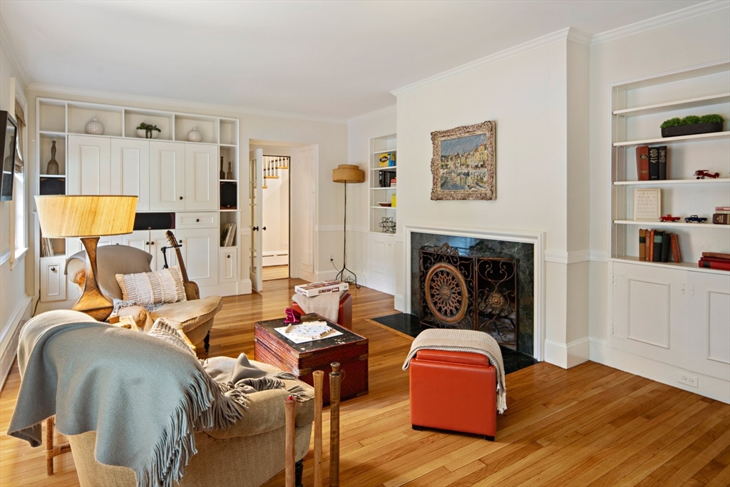 44 Ripley Hill Road Concord, MA 01742 - Photo 8 of 40 a bedroom with furniture and a fireplace