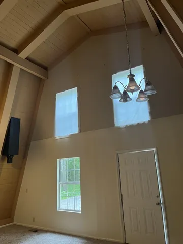 a picture of a window in an empty room