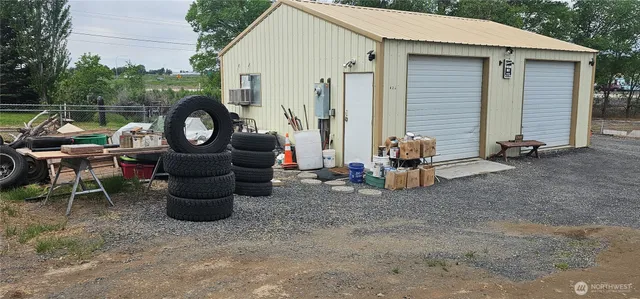 a view of a chairs and fire pit