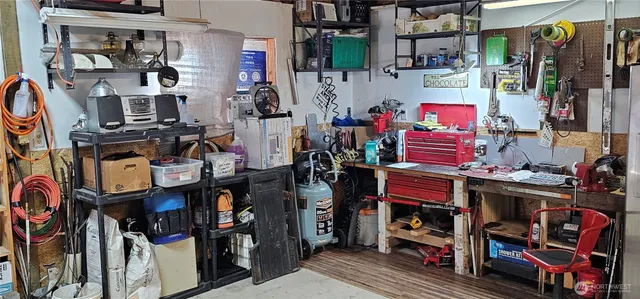 a store room with lots of different colored cloths