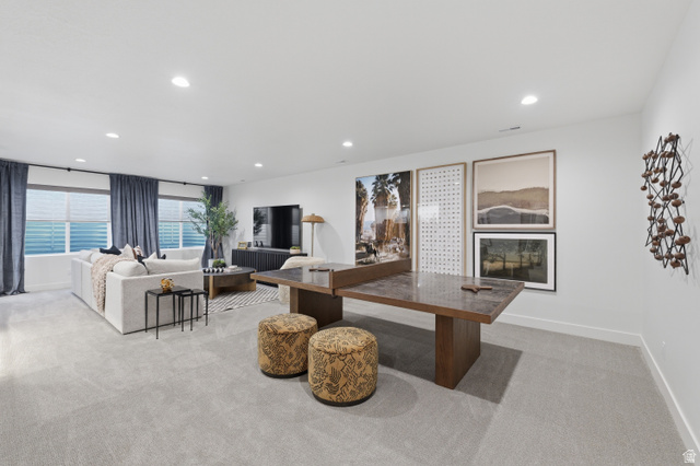 2559 West Aurora Avenue Mapleton, UT 84664 - Photo 47 of 60 Spacious recreation area featuring recessed lighting, light gray carpeting, and ample natural light from multiple windows