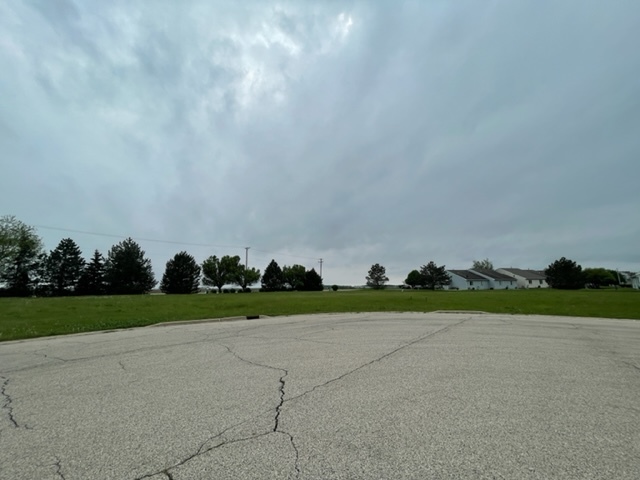 Lot 29 Cobblestone Circle Harvard, IL 60033 - Photo 2 of 2 a view of a field and trees in the background
