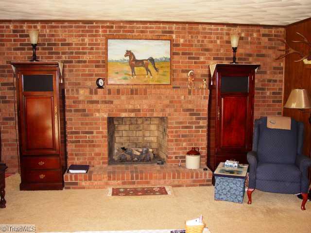 237 Williams Road Mocksville, NC 27028 - Photo 3 of 16 Living Room. Living Room Fire Place with Gas Logs and Remote starter.