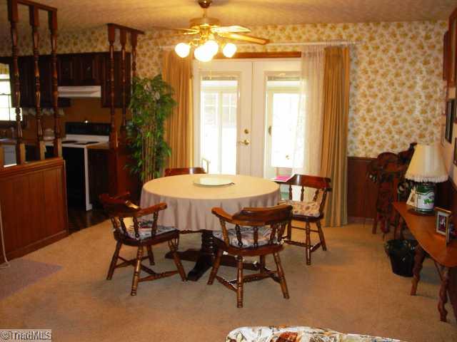 237 Williams Road Mocksville, NC 27028 - Photo 6 of 16 Dining Room. Dining room flow to Kitchen and Sun Room