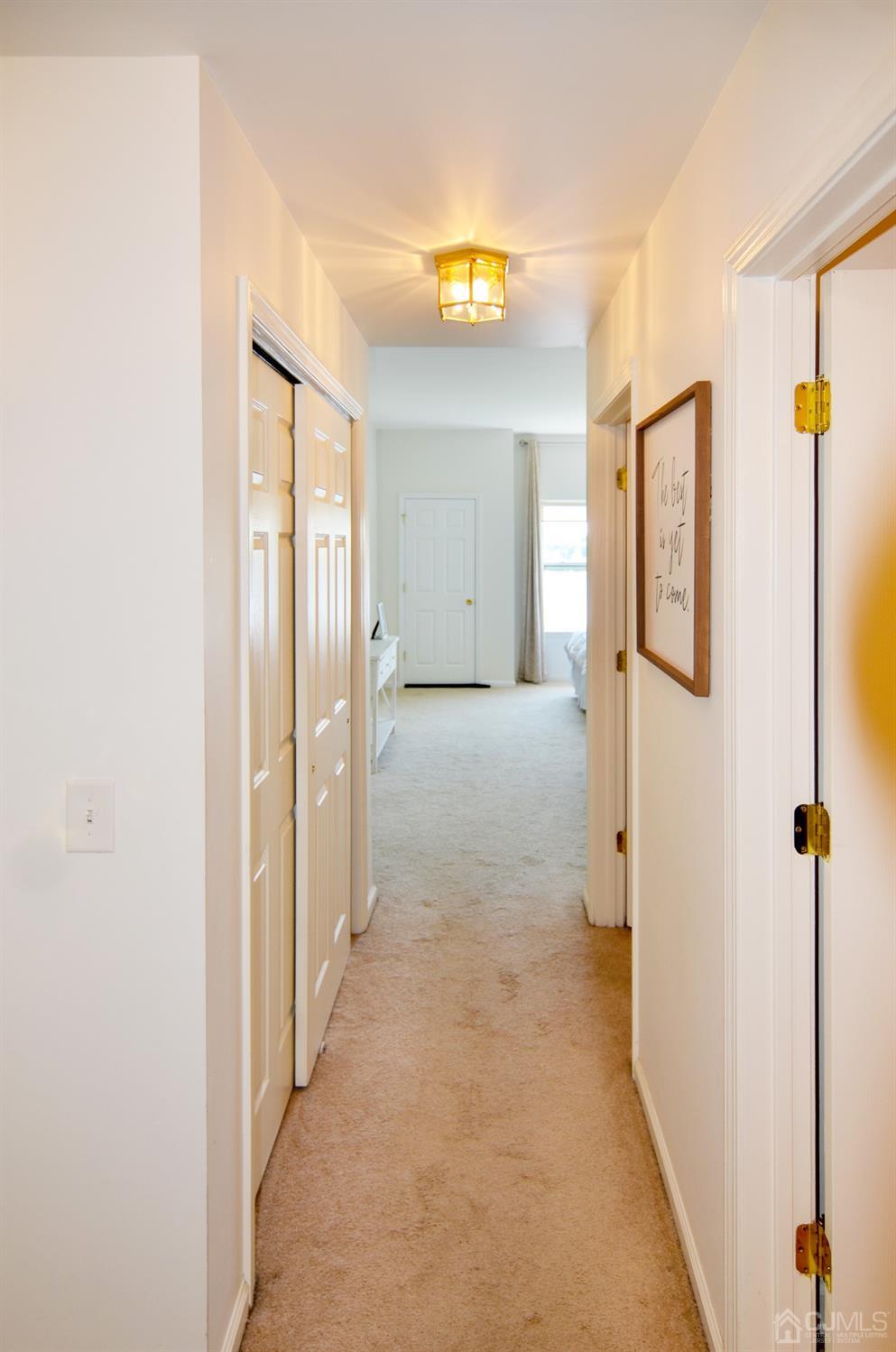 358 Rector Street, Unit 710 Perth Amboy, NJ 08861 - Photo 18 of 35 a view of a hallway with wooden shelves