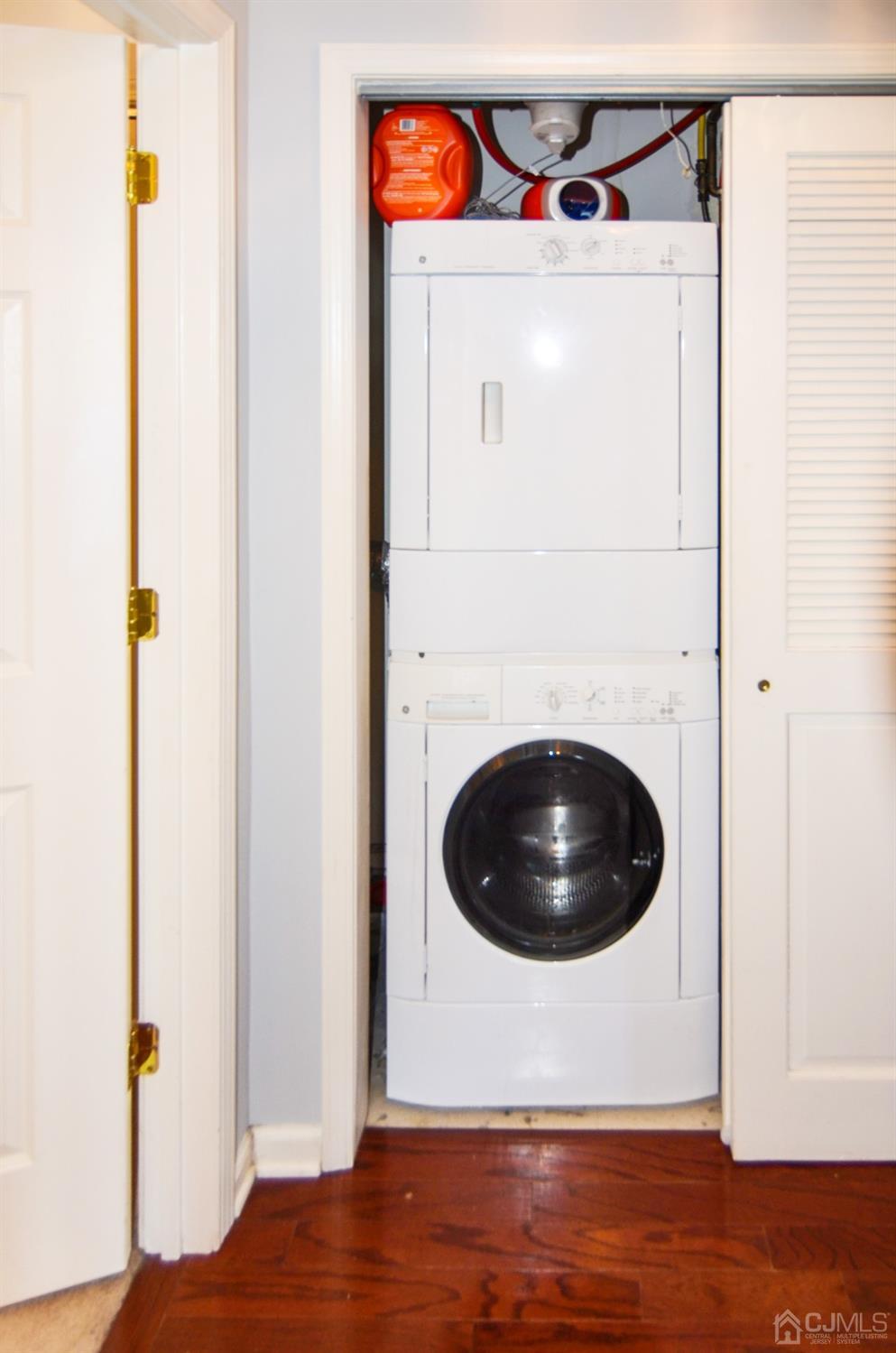 358 Rector Street, Unit 710 Perth Amboy, NJ 08861 - Photo 23 of 35 a view of a utility room with wooden floor and entryway