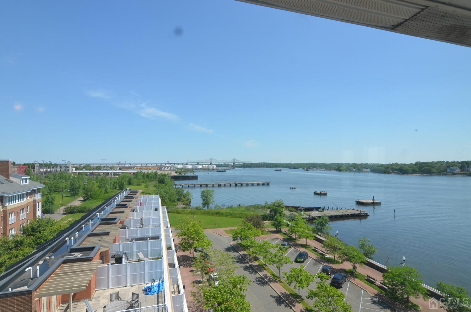 358 Rector Street, Unit 710 Perth Amboy, NJ 08861 - Photo 24 of 35 a view of a city from a lake