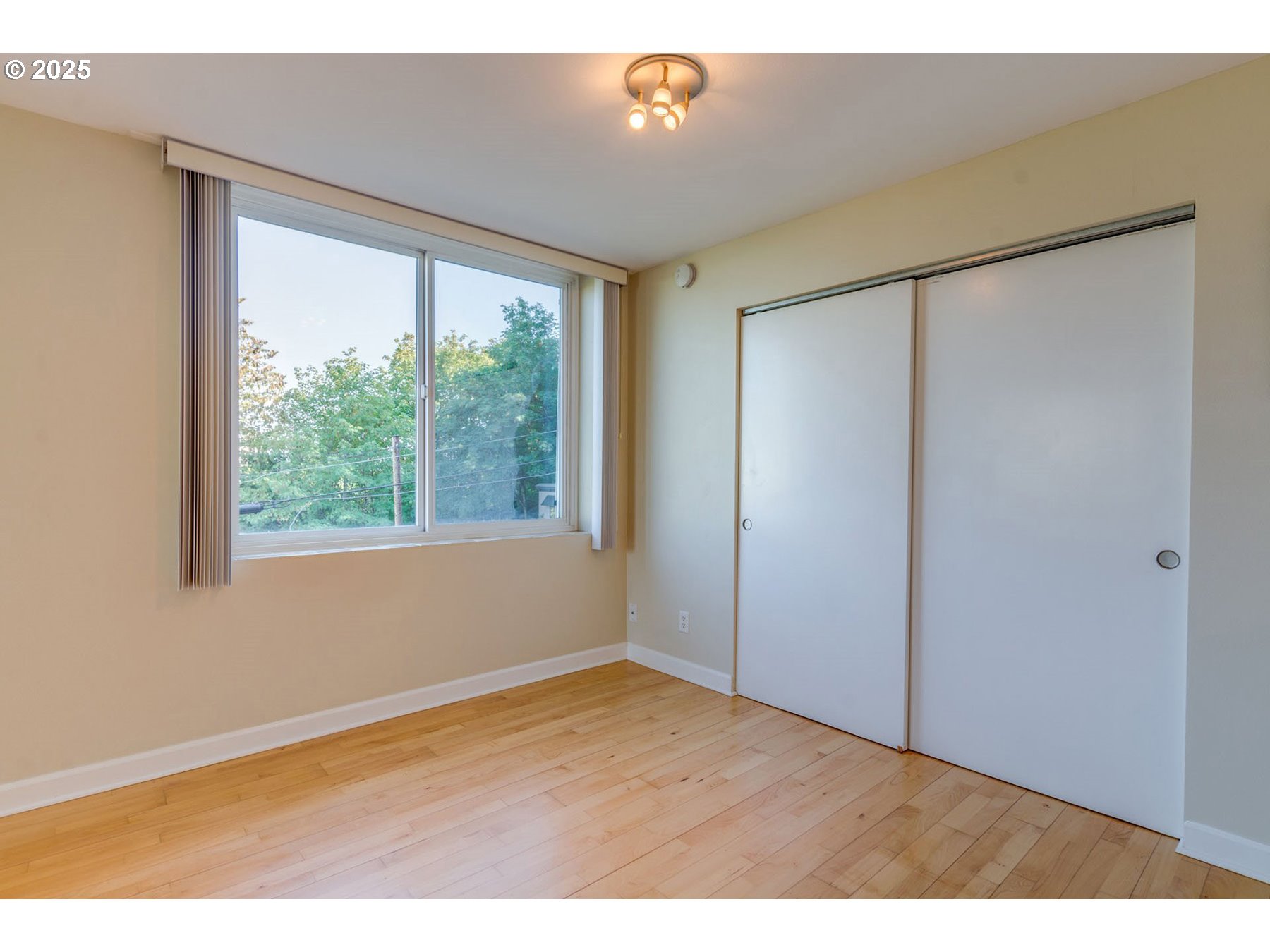 1205 Southwest Cardinell Drive, Unit 302 Portland, OR 97201 - Photo 16 of 23 a view of an empty room with a window
