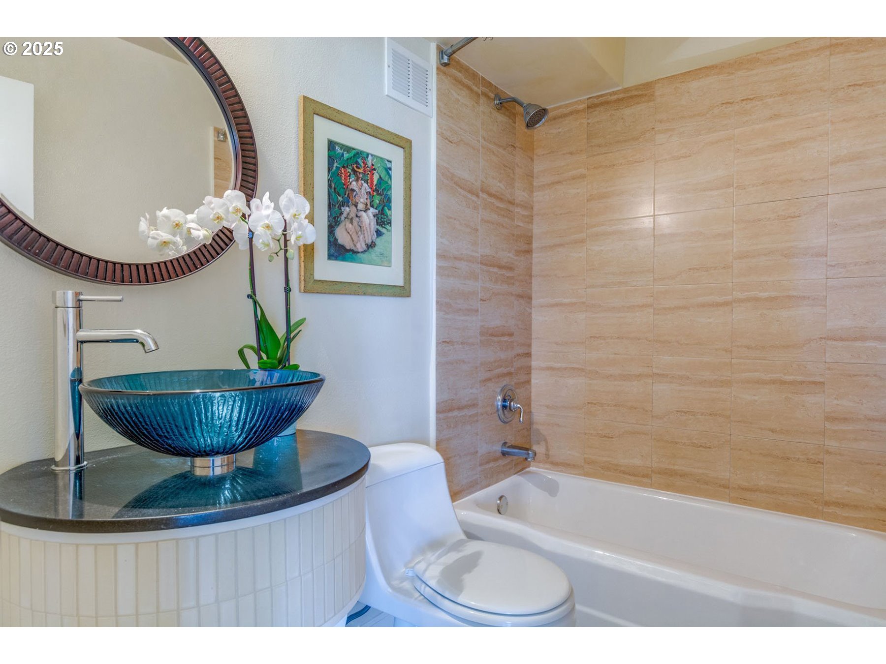 1205 Southwest Cardinell Drive, Unit 302 Portland, OR 97201 - Photo 19 of 23 a bathroom with a toilet a sink and a bathtub