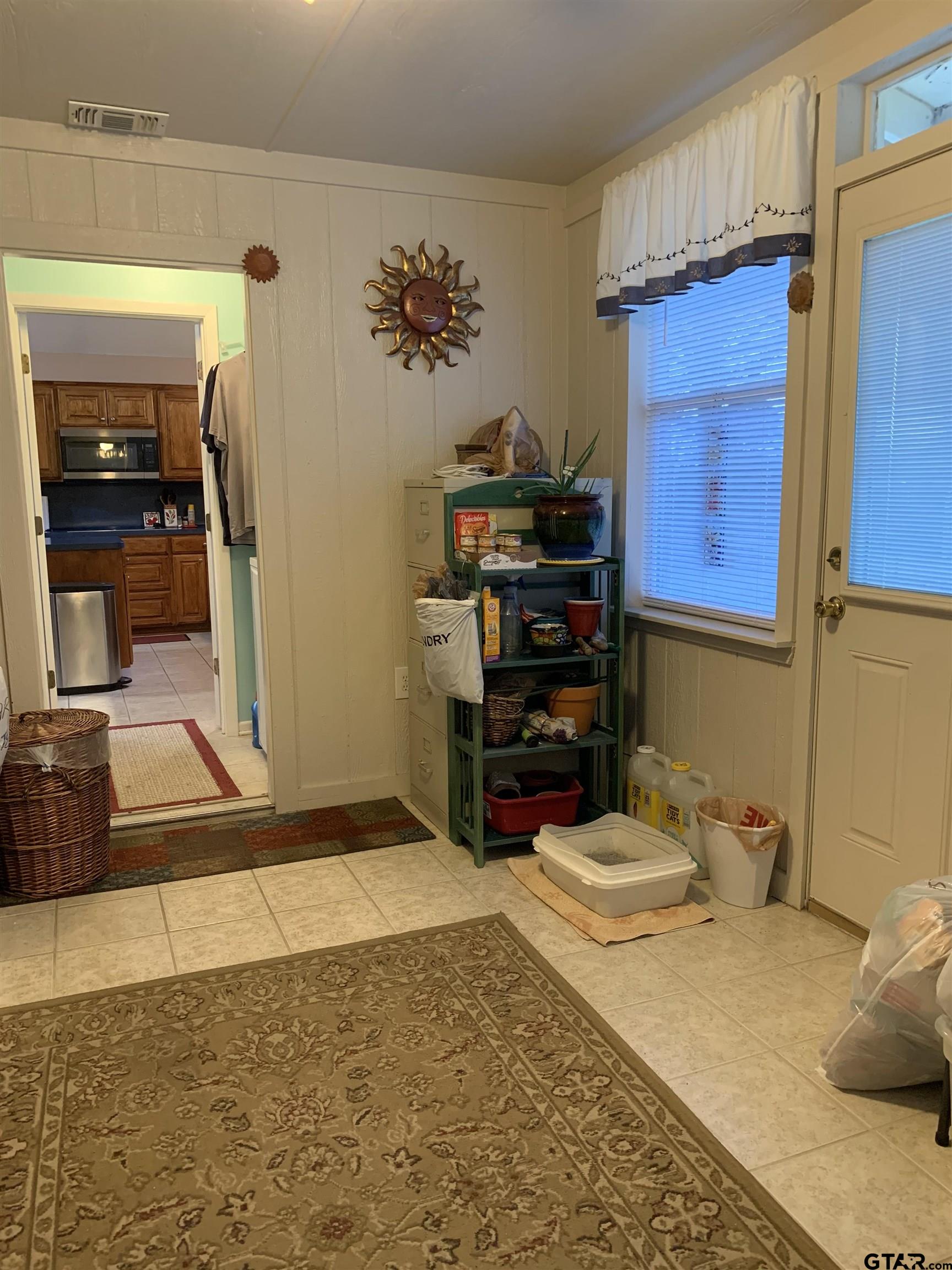 399 Cimarron Trail Holly Lake Ranch, TX 75765 - Photo 13 of 24 a bedroom with a bed and cabinets
