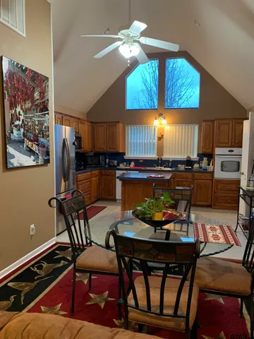 a bedroom with a bed and cabinets