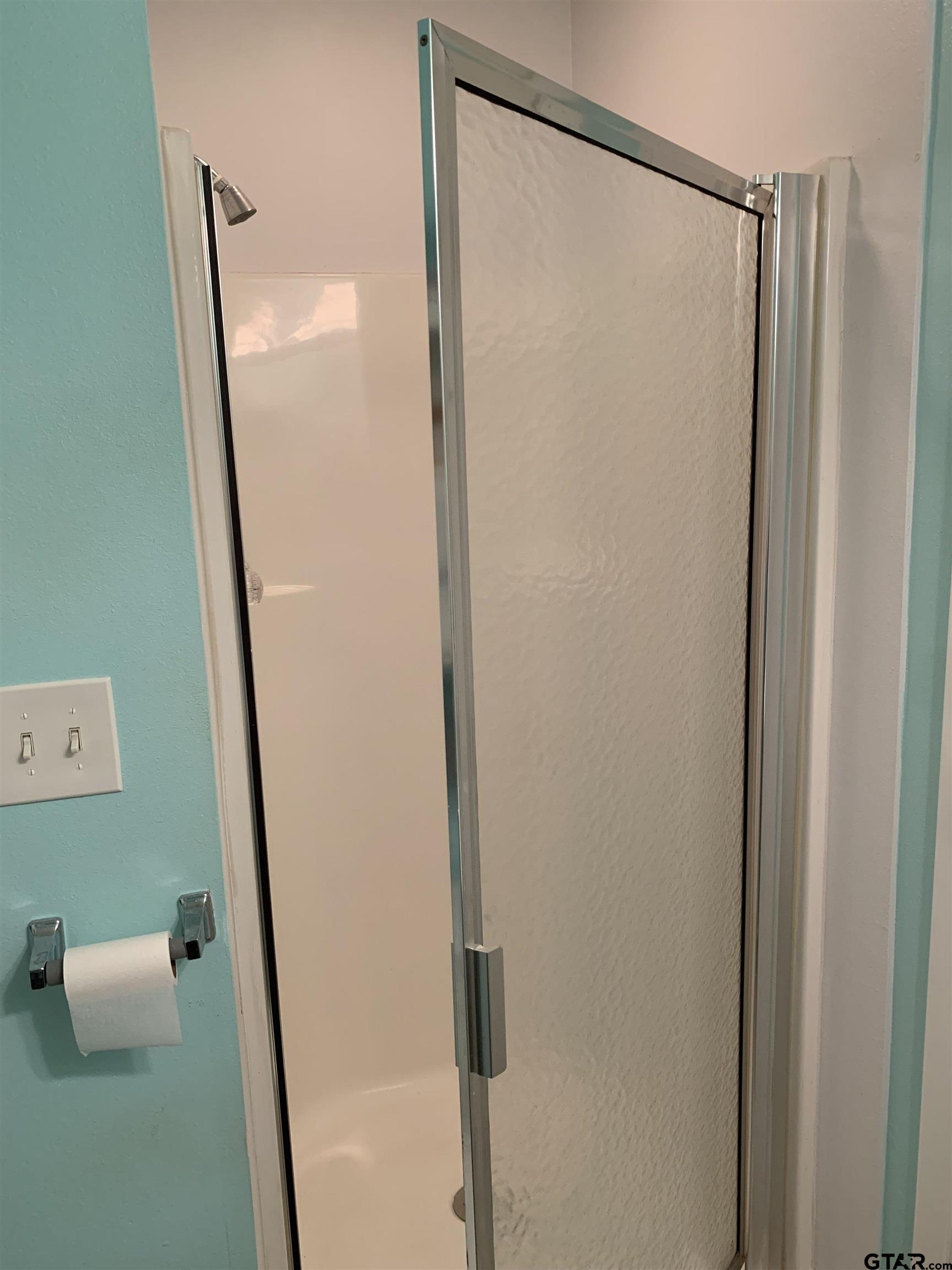 399 Cimarron Trail Holly Lake Ranch, TX 75765 - Photo 23 of 24 a bathroom with a shower and a sink