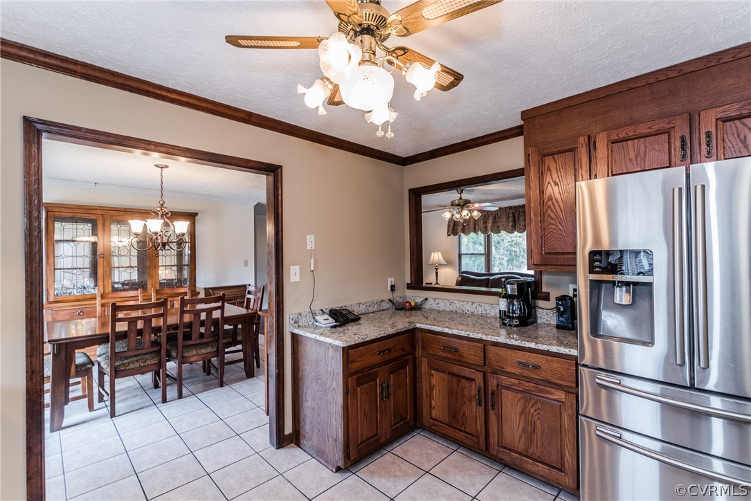 10623 River Road Chesterfield, VA 23838 - Photo 19 of 48 a kitchen with stainless steel appliances a stove refrigerator and cabinets