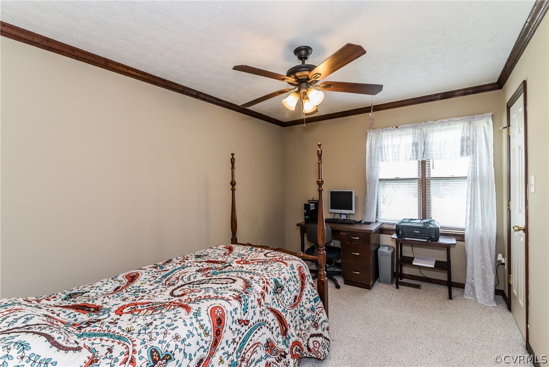10623 River Road Chesterfield, VA 23838 - Photo 24 of 48 a bedroom with a bed and a window