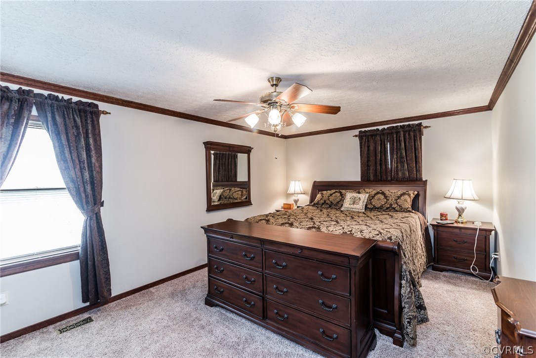 10623 River Road Chesterfield, VA 23838 - Photo 32 of 48 a bed room with a bed and a window