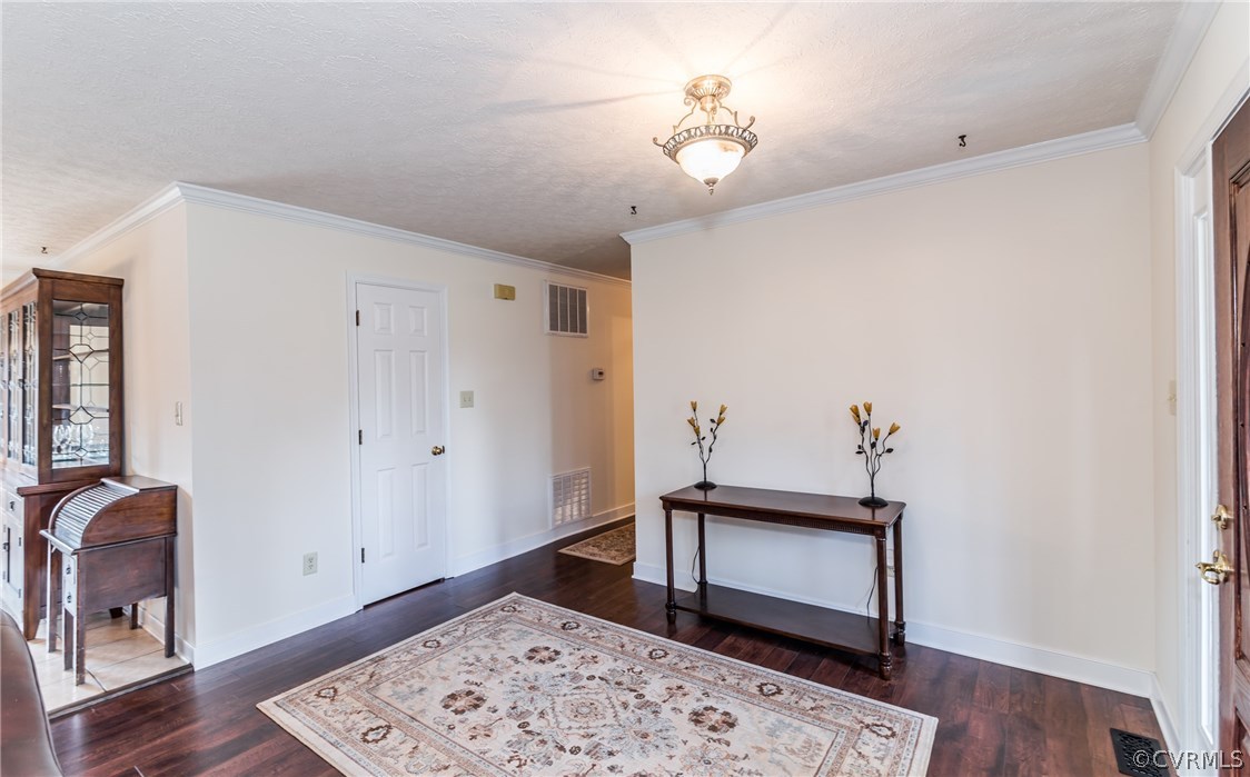 10623 River Road Chesterfield, VA 23838 - Photo 8 of 48 a view of an empty room with a window and wooden floor