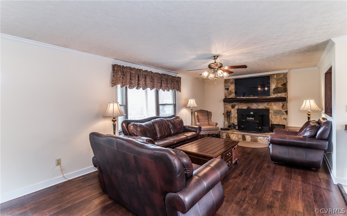 10623 River Road Chesterfield, VA 23838 - Photo 10 of 48 a living room with furniture a fireplace and a flat screen tv