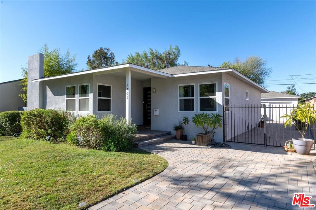 5705 Lemona Avenue Sherman Oaks, CA 91411 - Photo 1 of 30 a front view of a house with a yard