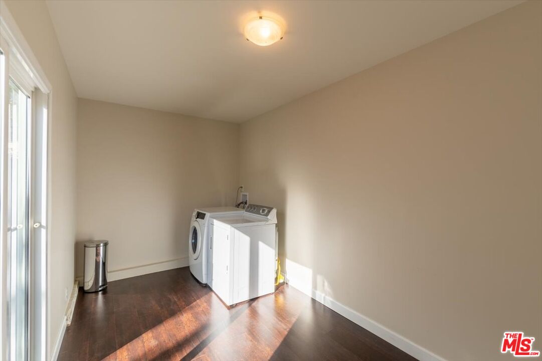 5705 Lemona Avenue Sherman Oaks, CA 91411 - Photo 21 of 30 a view of an empty room and wooden floor