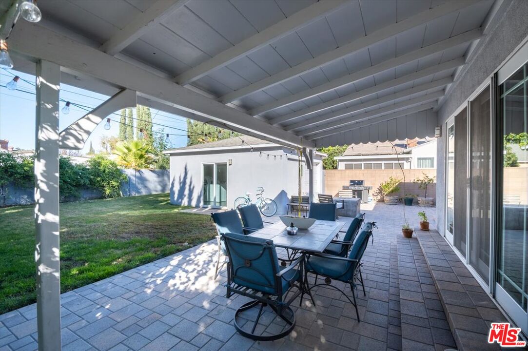 5705 Lemona Avenue Sherman Oaks, CA 91411 - Photo 24 of 30 a dining room with furniture and garden