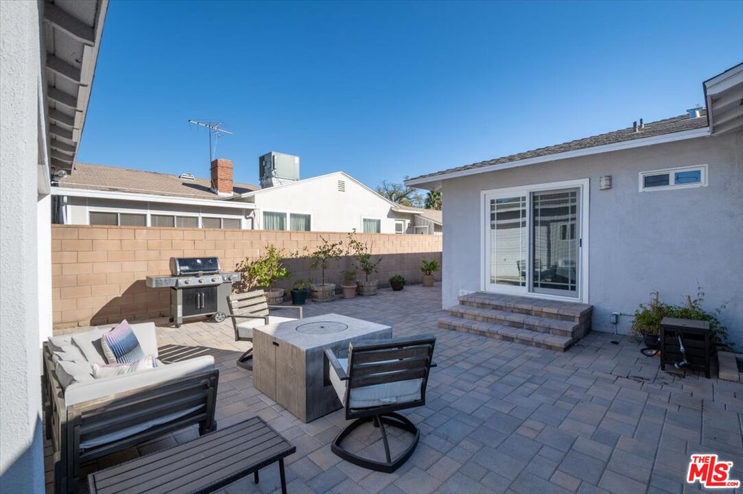 5705 Lemona Avenue Sherman Oaks, CA 91411 - Photo 29 of 30 a balcony with furniture and a potted plant