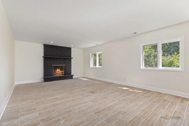 a bathroom with a toilet sink and shower
