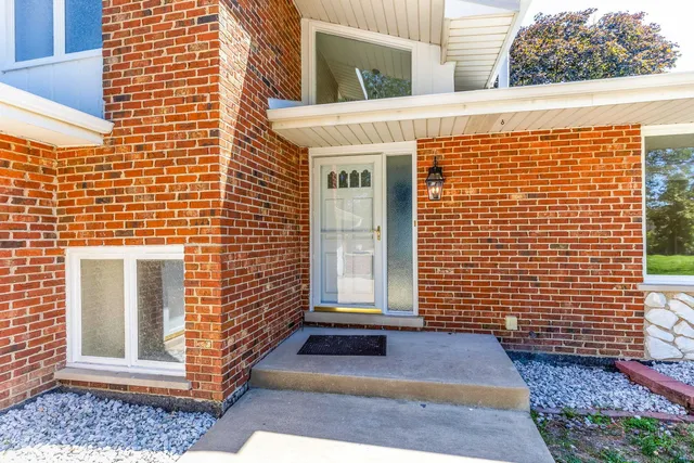 a kitchen with stainless steel appliances granite countertop a stove and a microwave