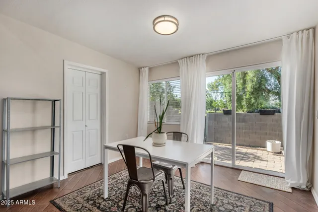 a view of a livingroom with furniture and window