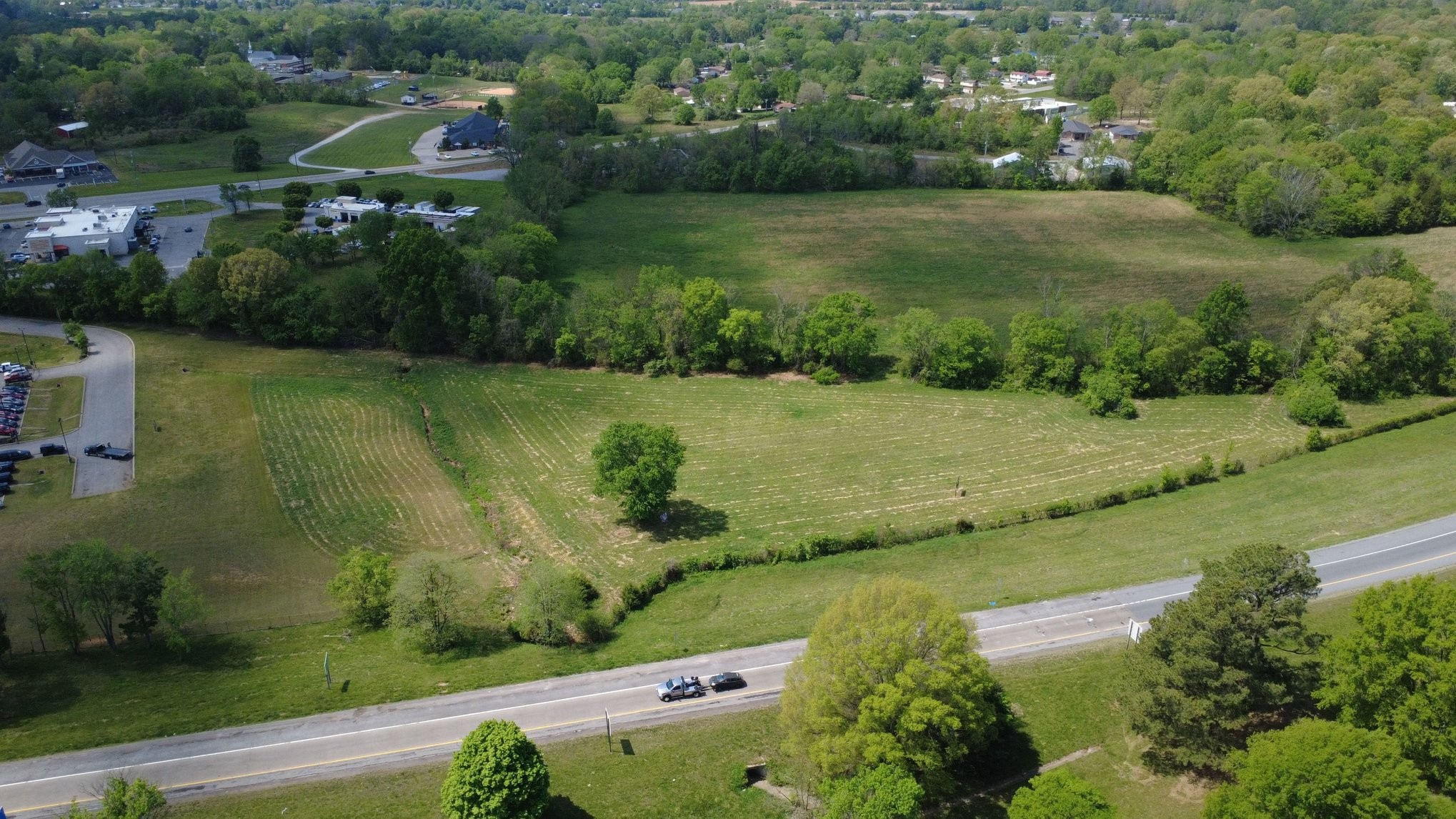0 Highway 49 West Pleasant View, TN 37146 - Photo 12 of 21 an aerial view of residential houses with outdoor space and trees
