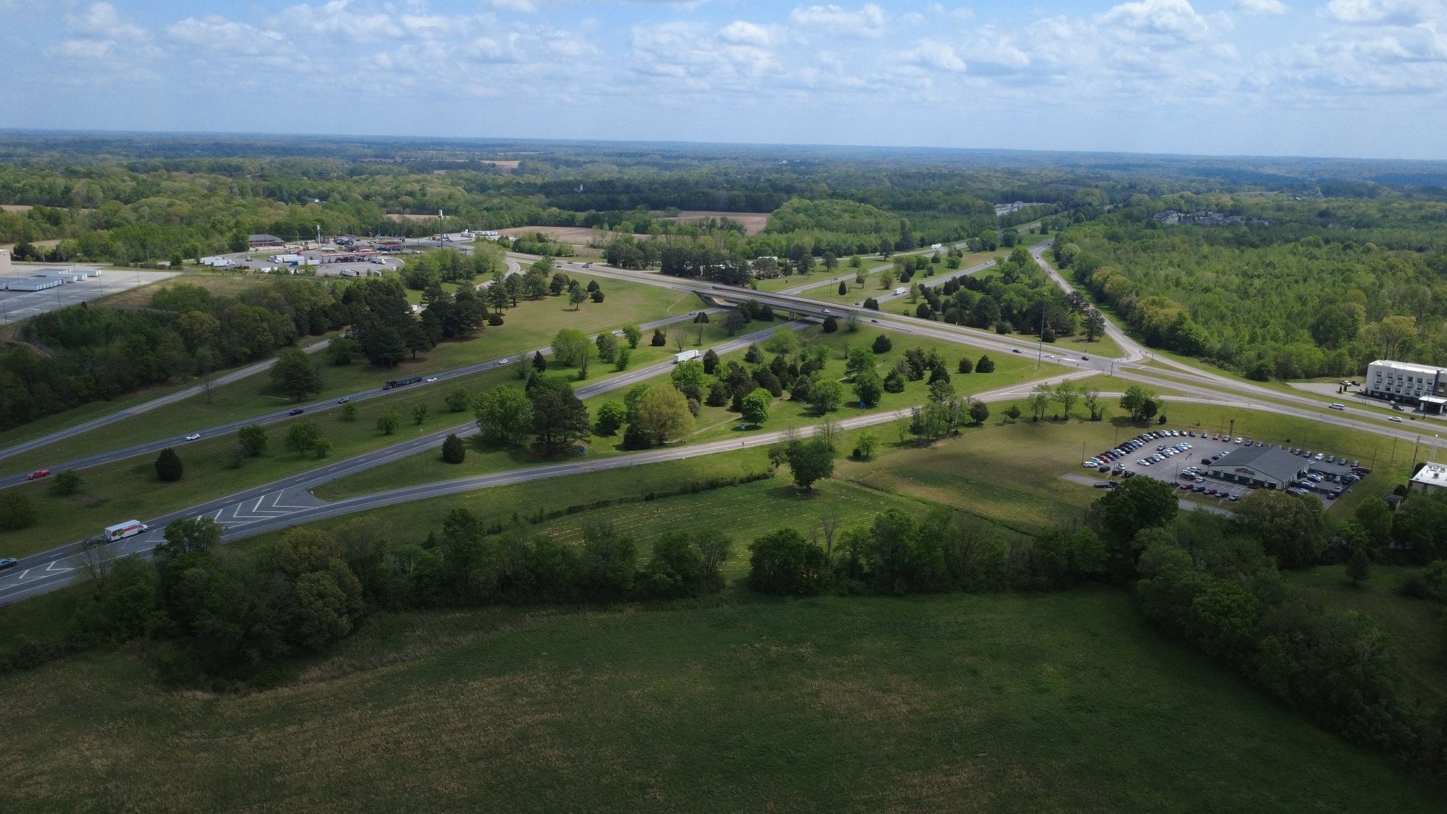 0 Highway 49 West Pleasant View, TN 37146 - Photo 18 of 21 an aerial view of residential houses with outdoor space and trees