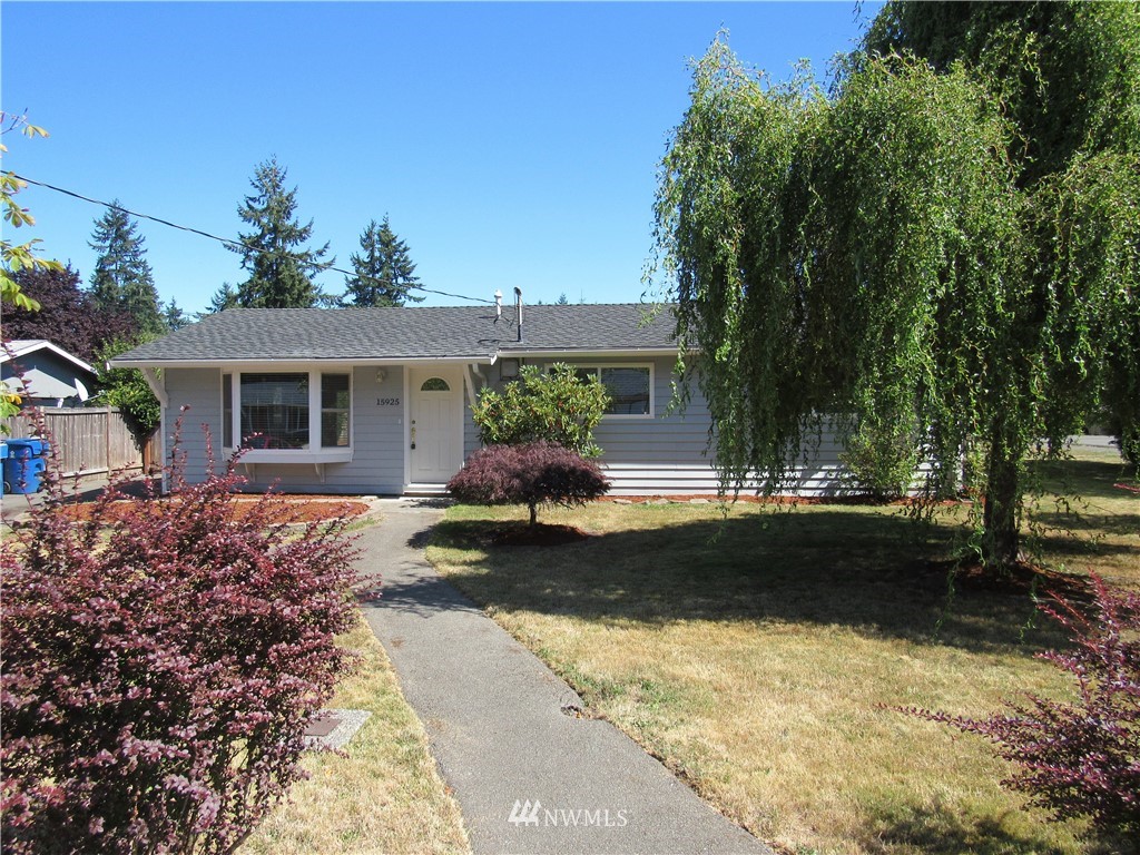 15925 53rd Place West Edmonds, WA 98026 - Photo 1 of 23 a front view of a house with garden