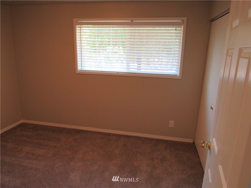 15925 53rd Place West Edmonds, WA 98026 - Photo 12 of 23 a view of an empty room with a window