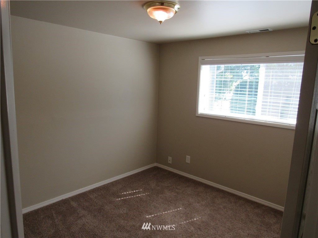 15925 53rd Place West Edmonds, WA 98026 - Photo 13 of 23 an empty room with a window