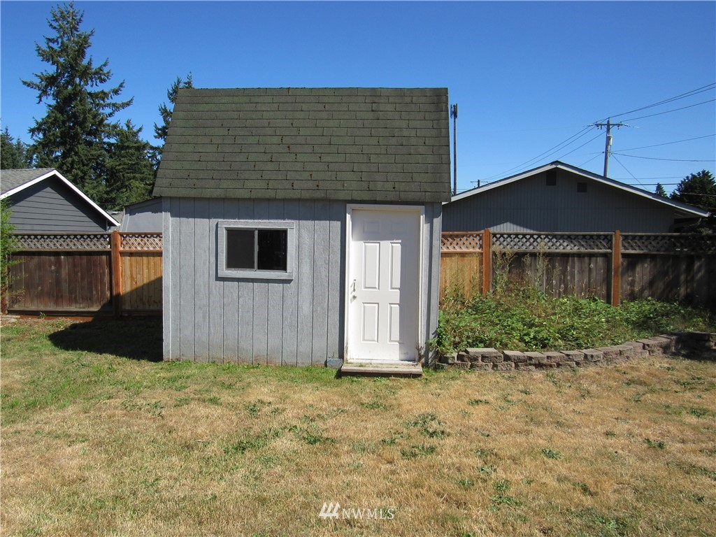 15925 53rd Place West Edmonds, WA 98026 - Photo 19 of 23 a front view of a house with garden