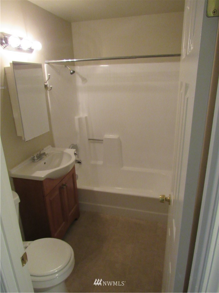15925 53rd Place West Edmonds, WA 98026 - Photo 10 of 23 a bathroom with a sink a toilet and shower