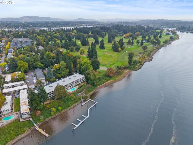 an aerial view of a city with lots of residential buildings