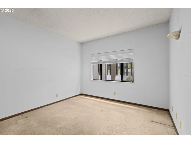 a view of an empty room with window