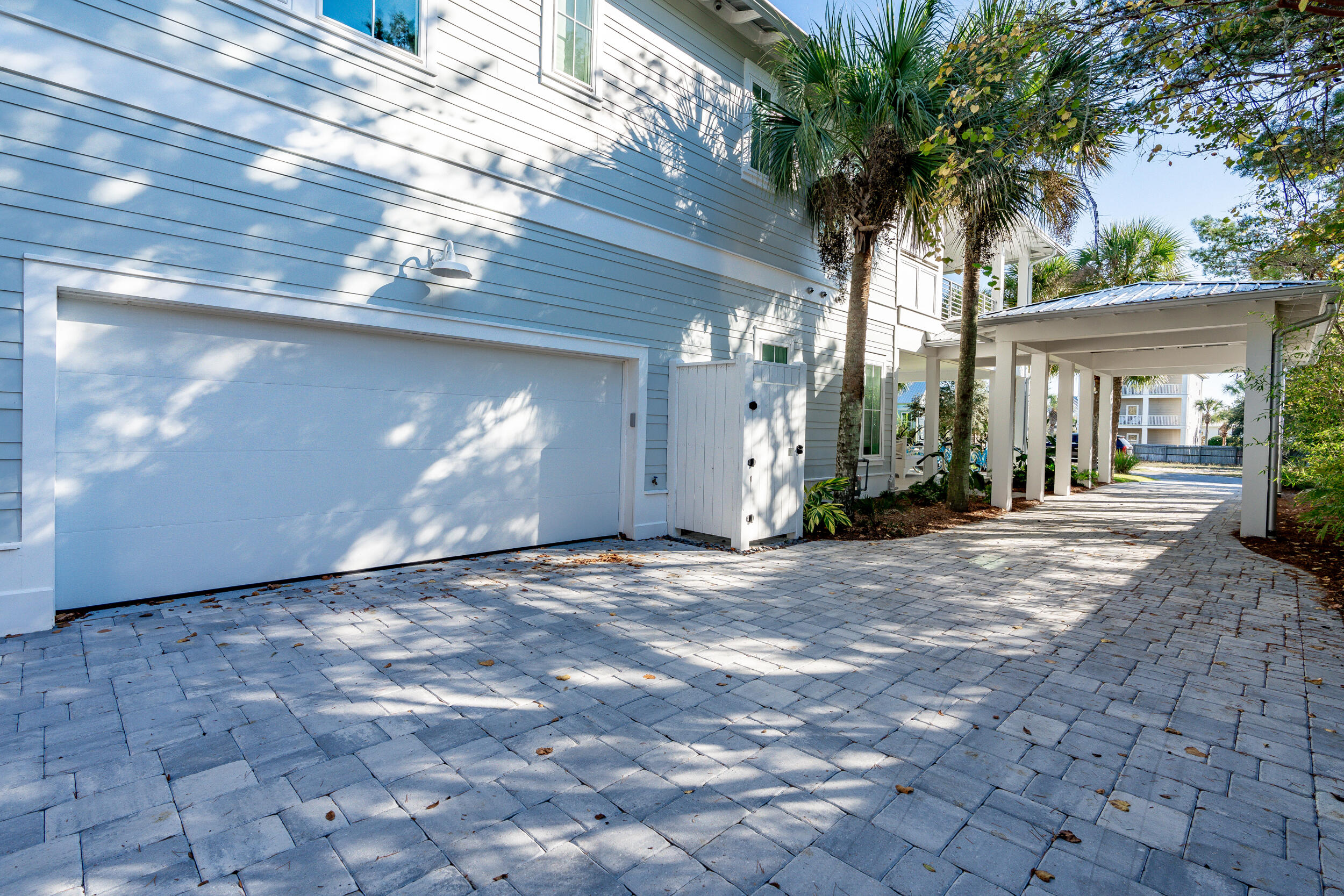53 Buddy Street Santa Rosa Beach, FL 32459 - Photo 101 of 143 a view of a house with a yard and potted plants