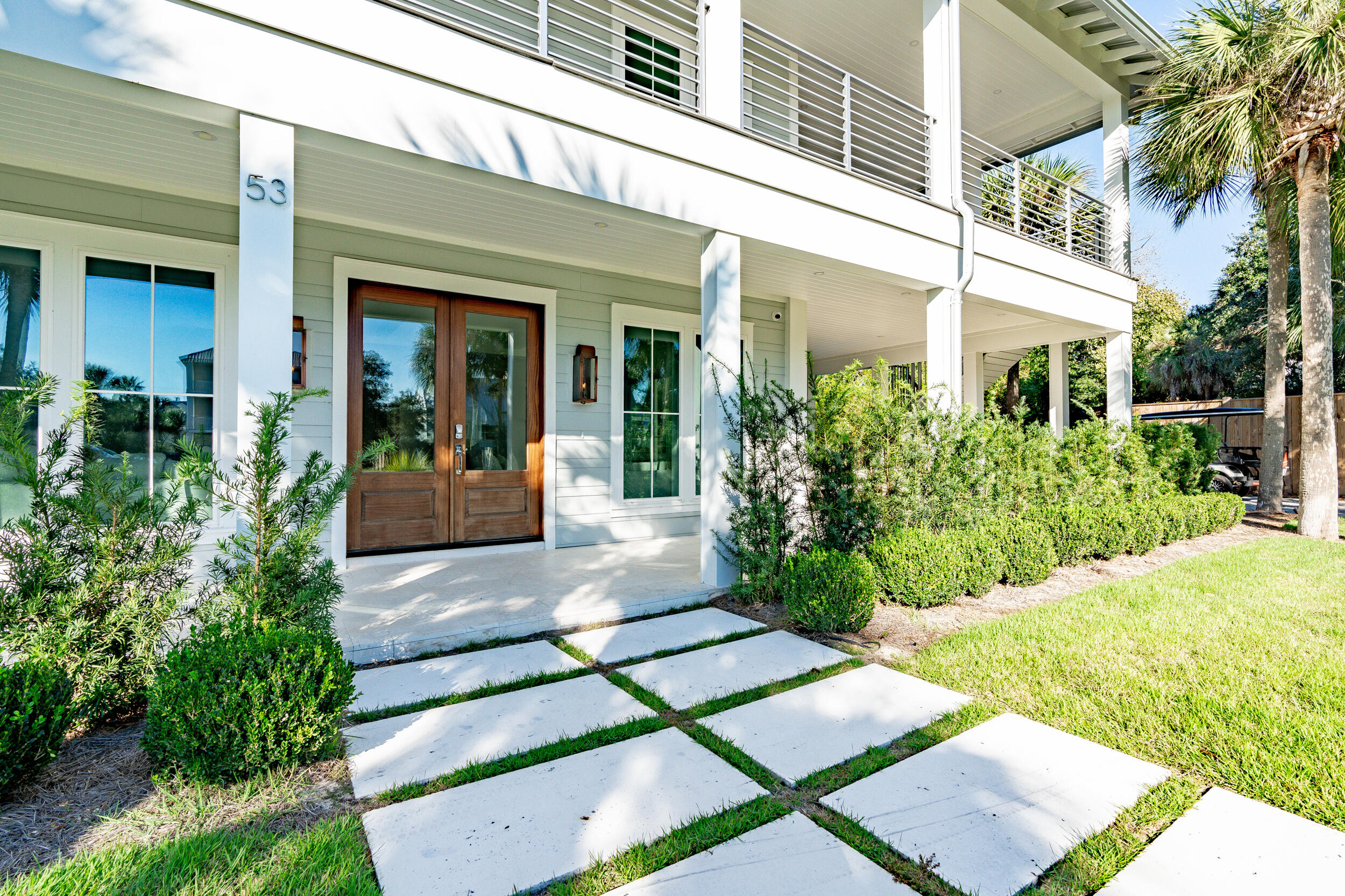 53 Buddy Street Santa Rosa Beach, FL 32459 - Photo 116 of 143 a view of a building with potted plants
