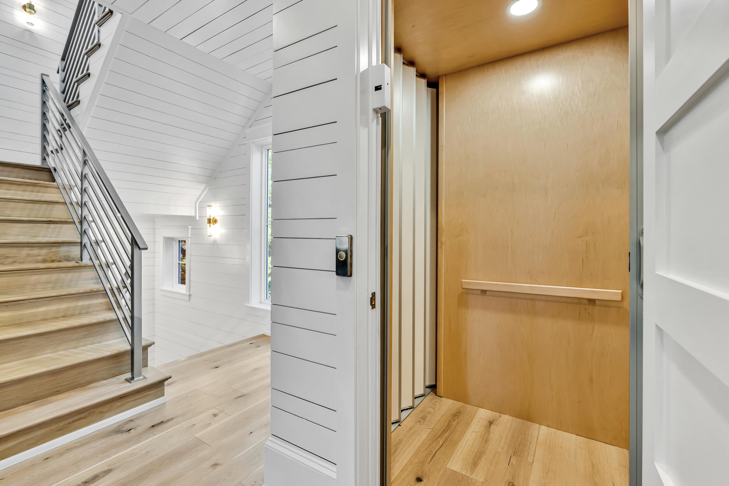 53 Buddy Street Santa Rosa Beach, FL 32459 - Photo 32 of 143 a view of a hallway with wooden floor and entryway