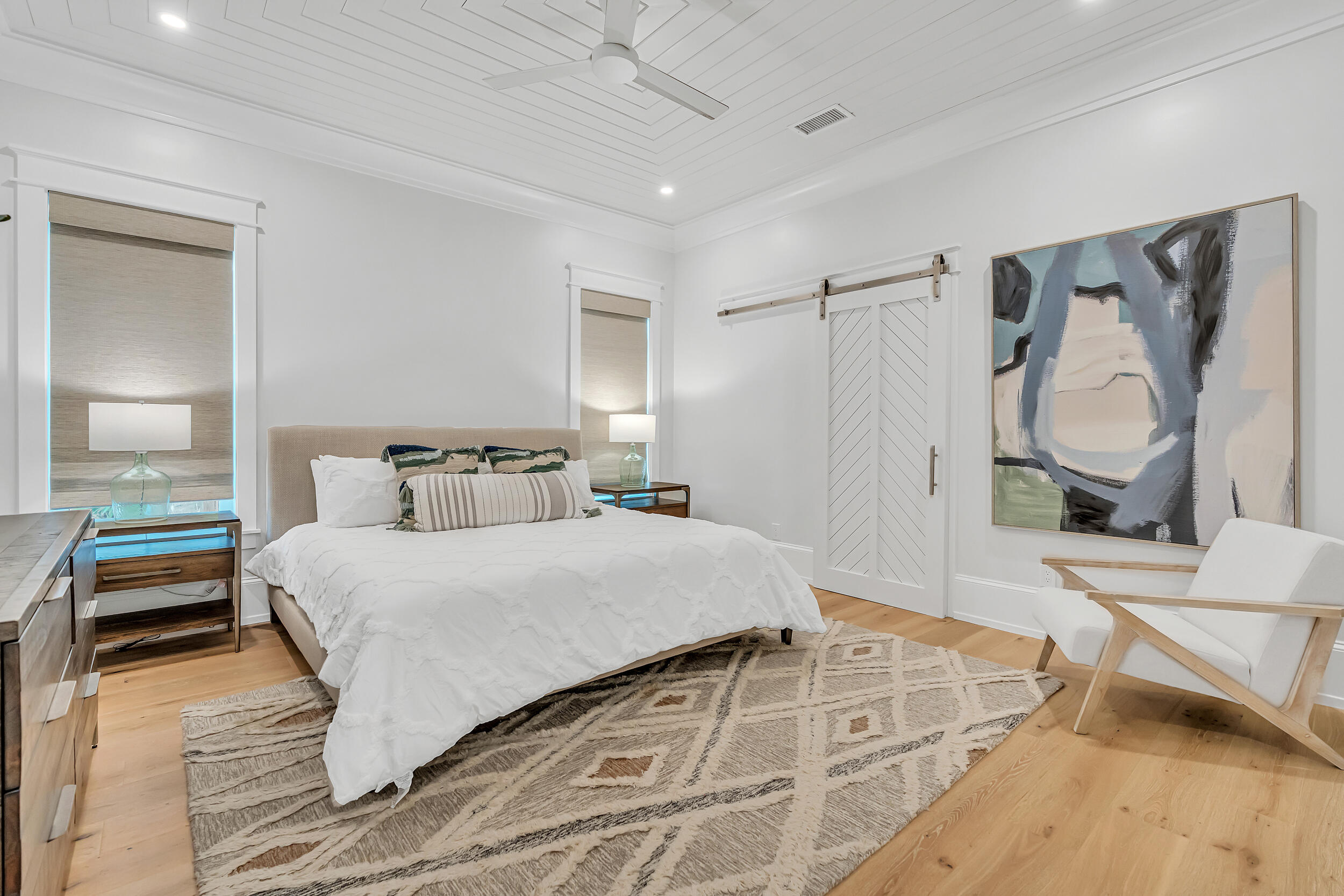 53 Buddy Street Santa Rosa Beach, FL 32459 - Photo 47 of 143 a bedroom with a bed and a mirror