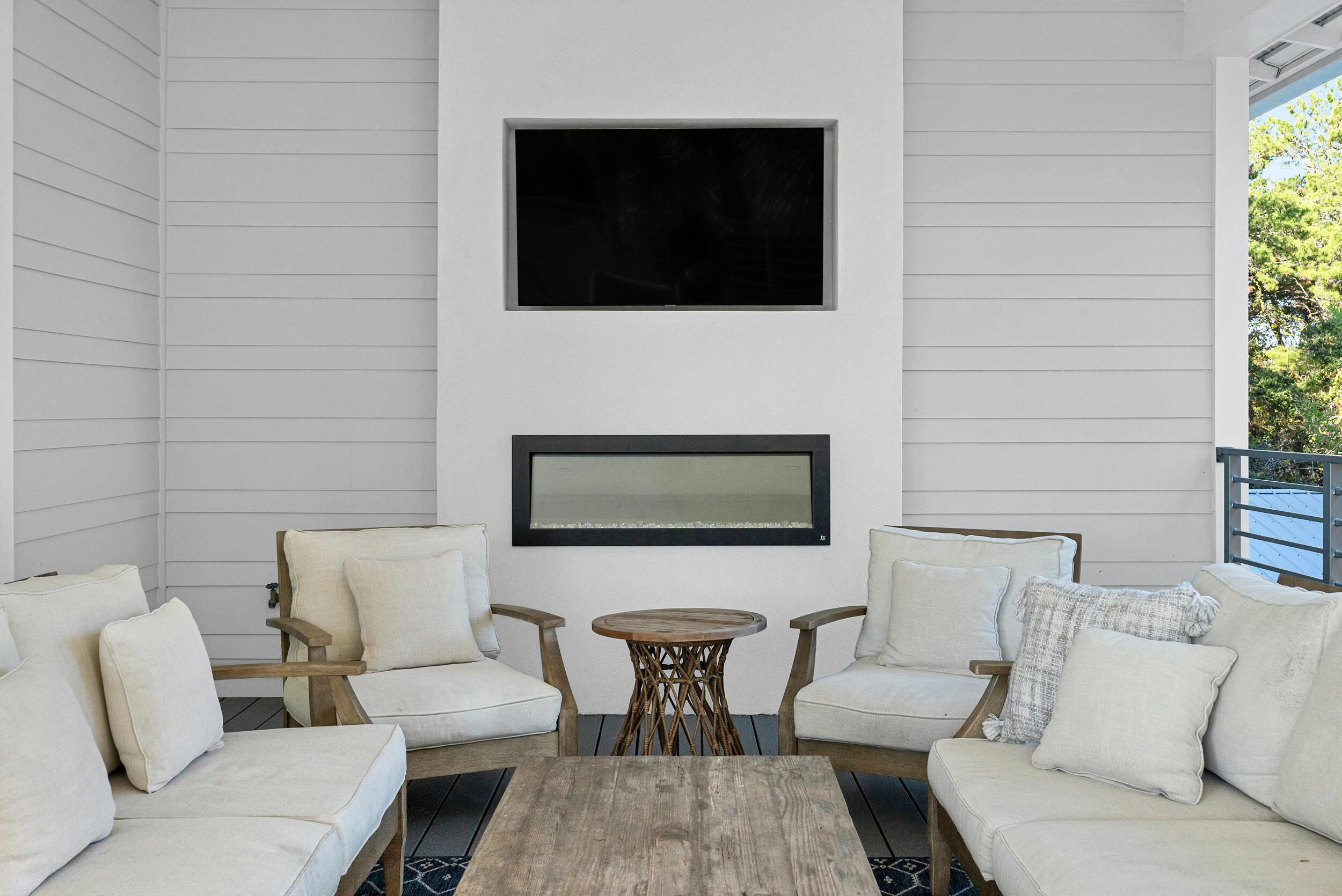 53 Buddy Street Santa Rosa Beach, FL 32459 - Photo 64 of 143 a living room with furniture and a flat screen tv