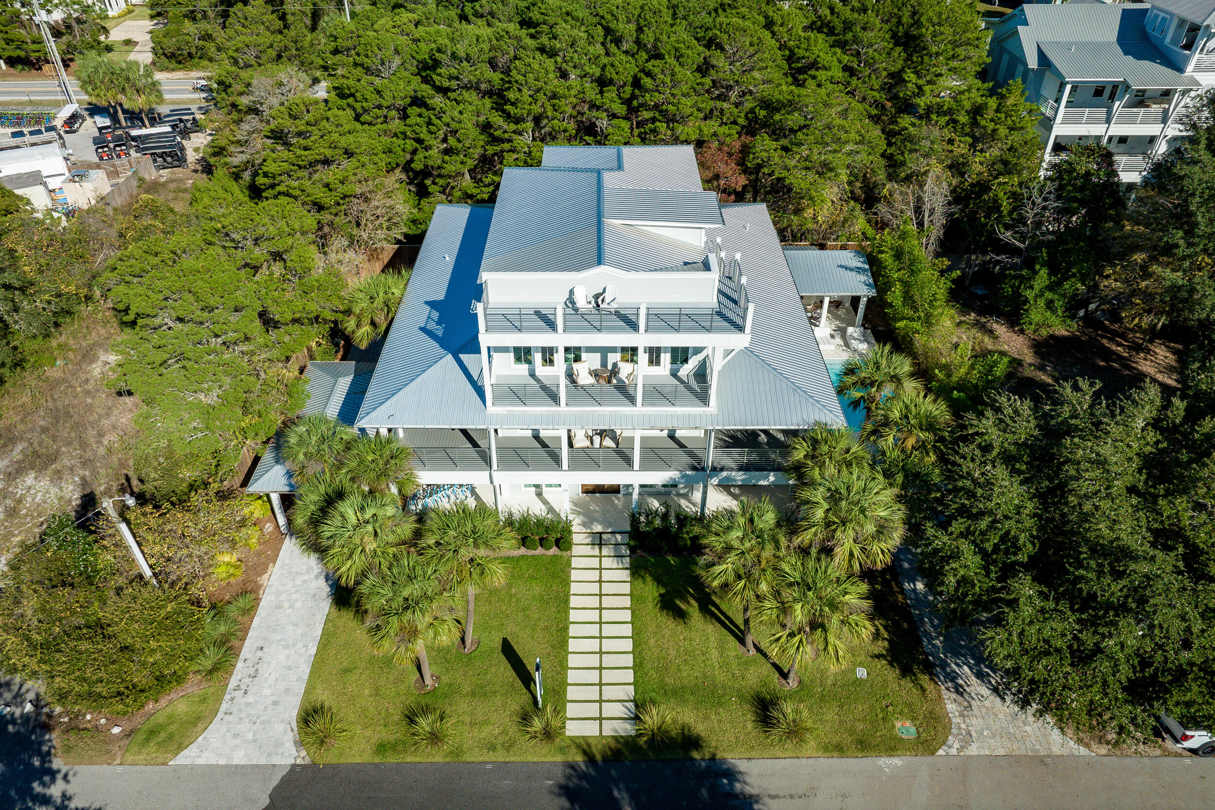 53 Buddy Street Santa Rosa Beach, FL 32459 - Photo 87 of 143 an aerial view of a house with a yard and large trees