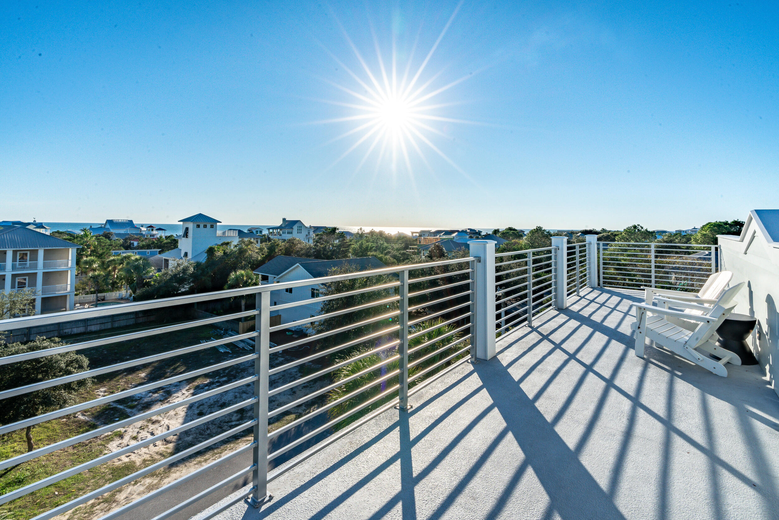 53 Buddy Street Santa Rosa Beach, FL 32459 - Photo 100 of 143 a view of balcony with wooden floor and fence