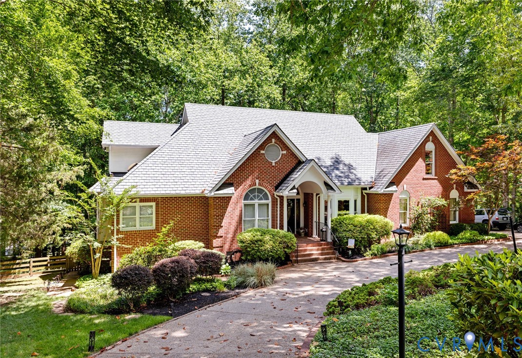 36 Dahlgren Road Richmond, VA 23238 - Photo 3 of 48 front view of a house and a yard