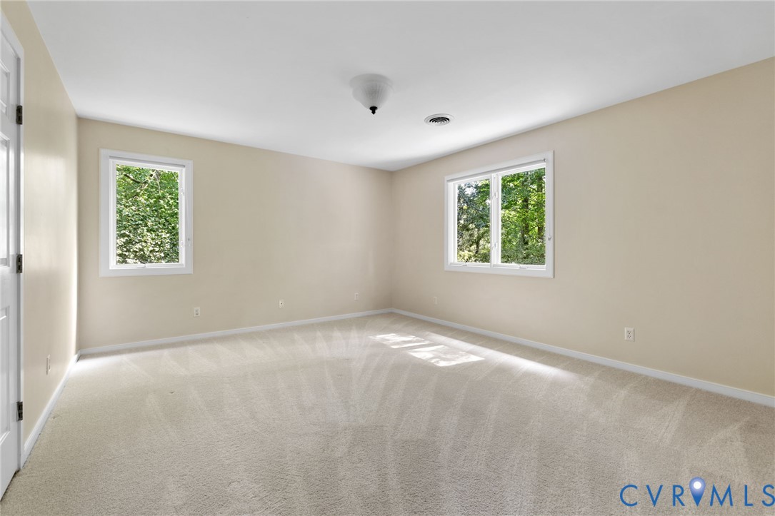 36 Dahlgren Road Richmond, VA 23238 - Photo 31 of 48 a view of an empty room with a window
